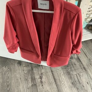 Ladies size small stylish coral blazer.